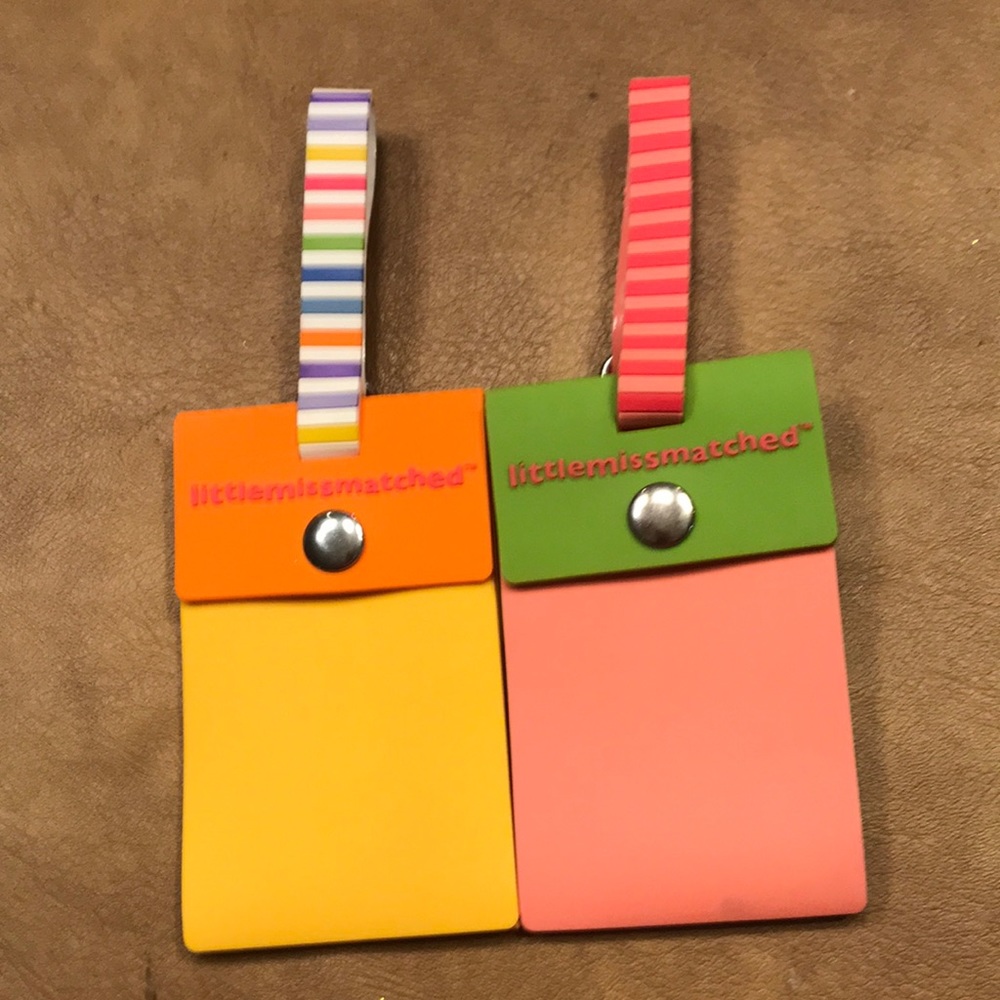 Two Littlemissmatched luggage tags
